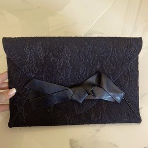 BCBG Lace Clutch